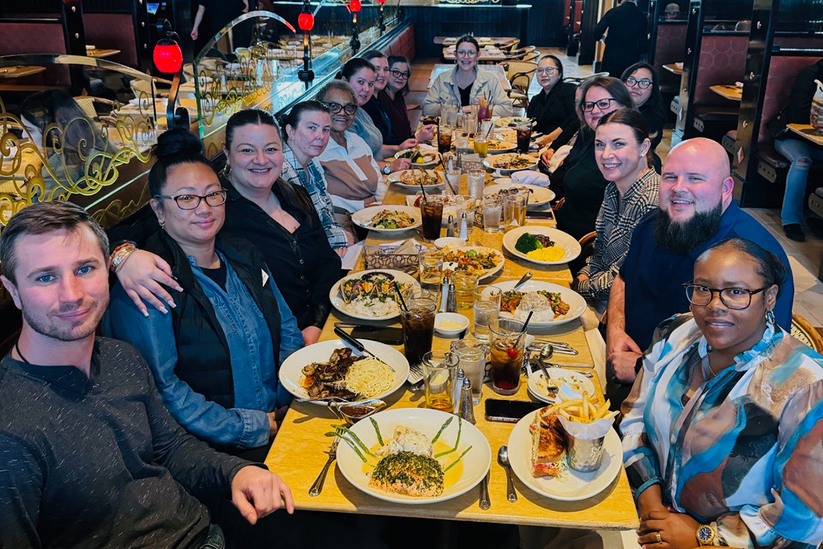 Woodside employees eating out together